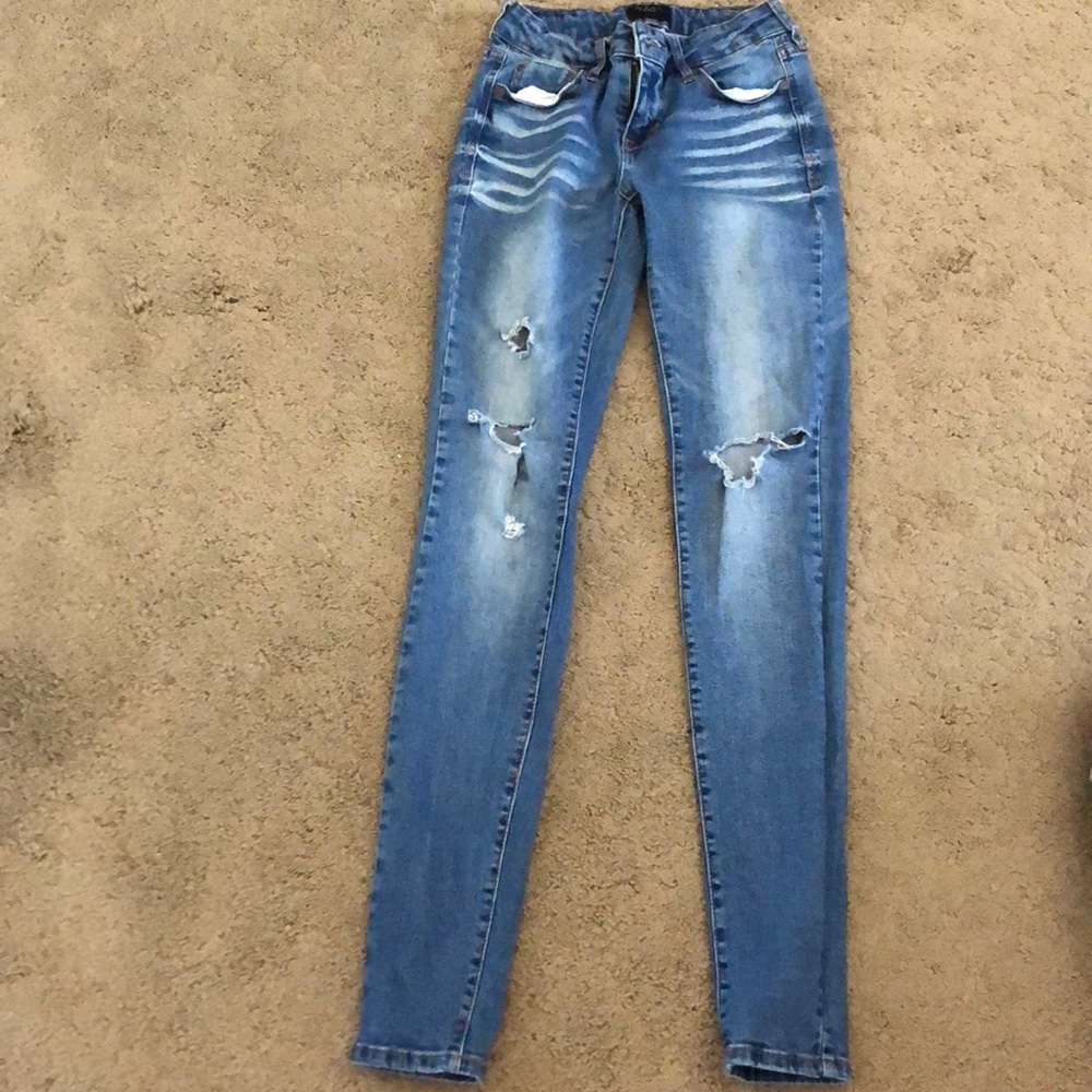 Celebrity Pink destroyed skinny jeans